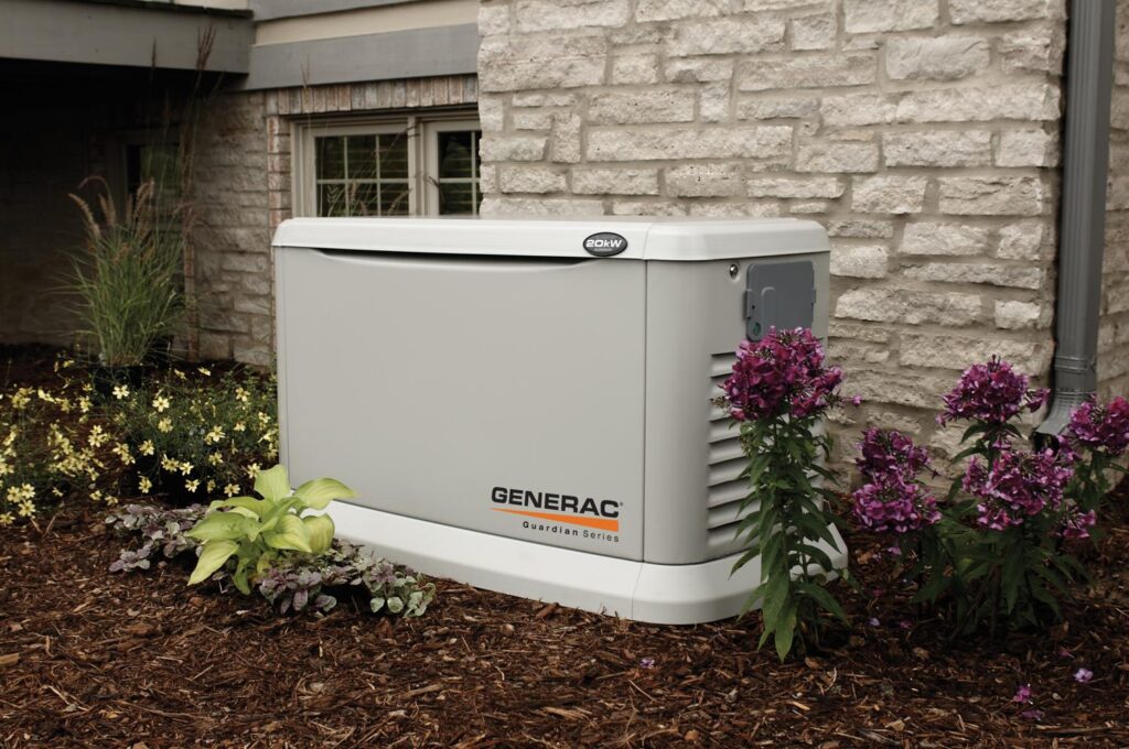 New Generac generator next to a white brick home in Delaware.