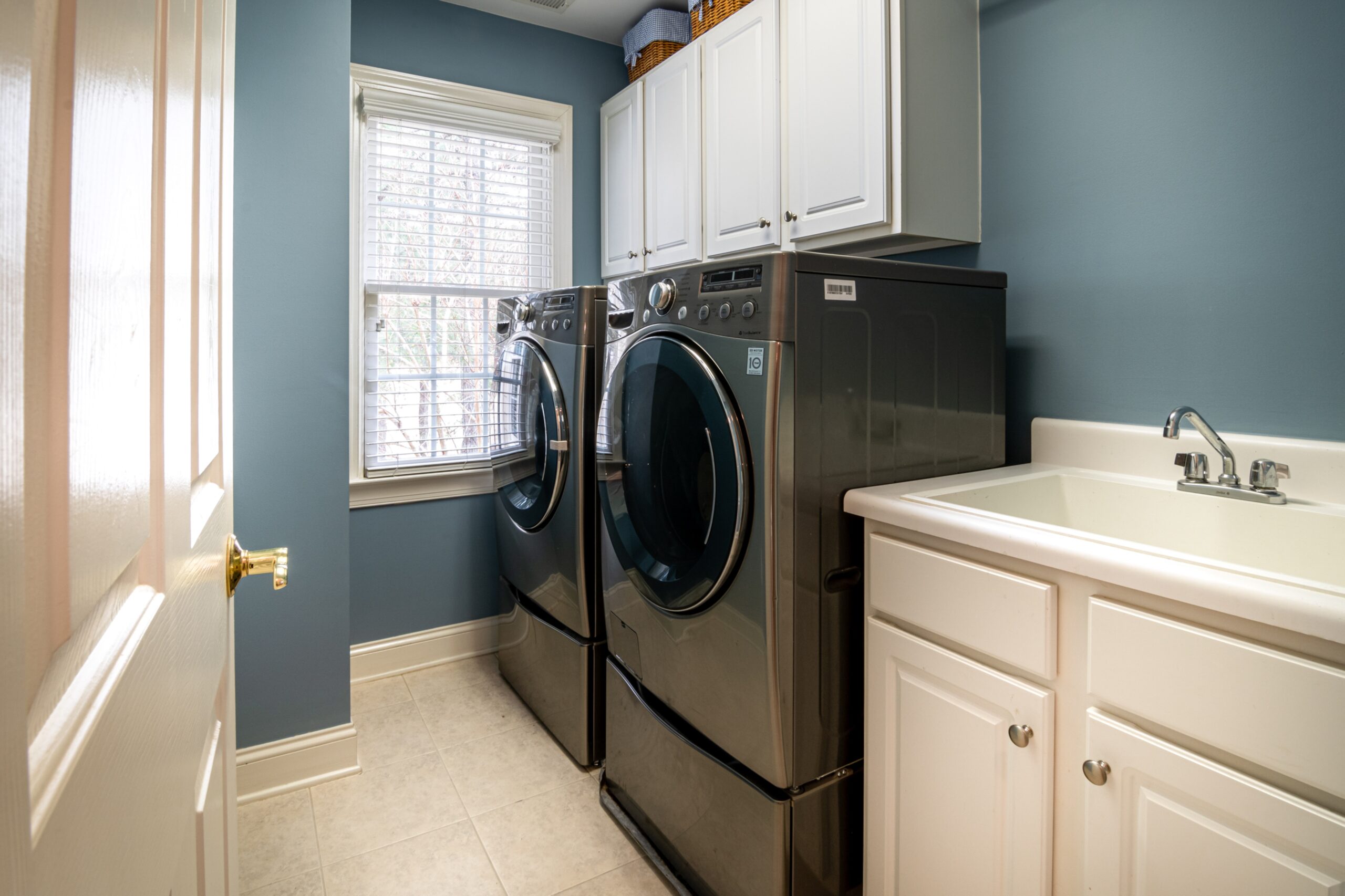 New washer and dryer recently installed in a laundry room.