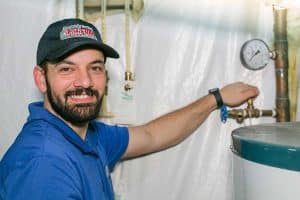 Plumber-fixing-water-heater