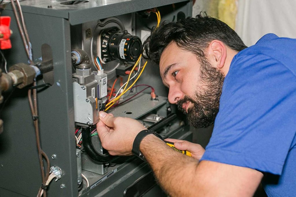 technician-working-on-furnace-2.jpg